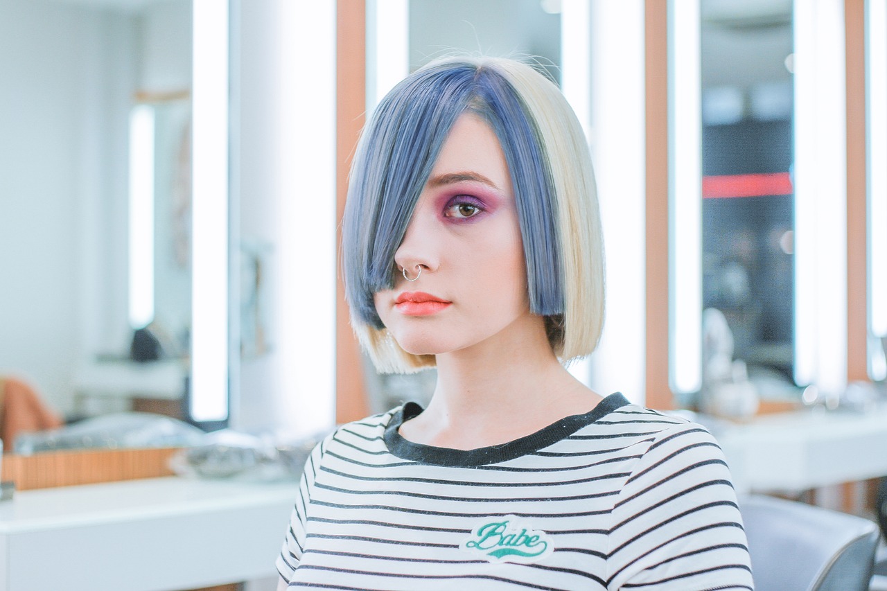 Woman at a salon mirror station